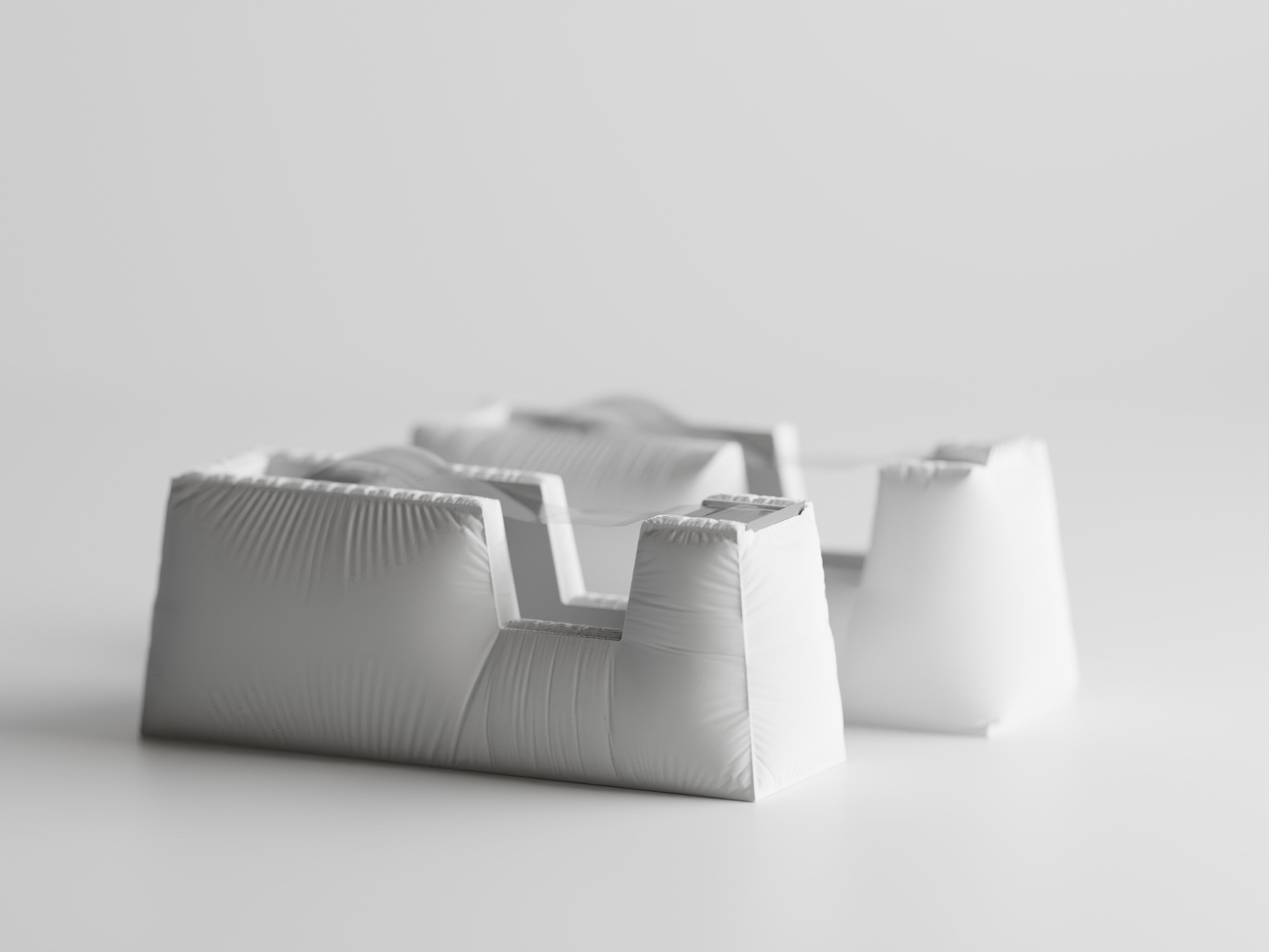 TapeNest – Fabric-Textured Tape Dispenser