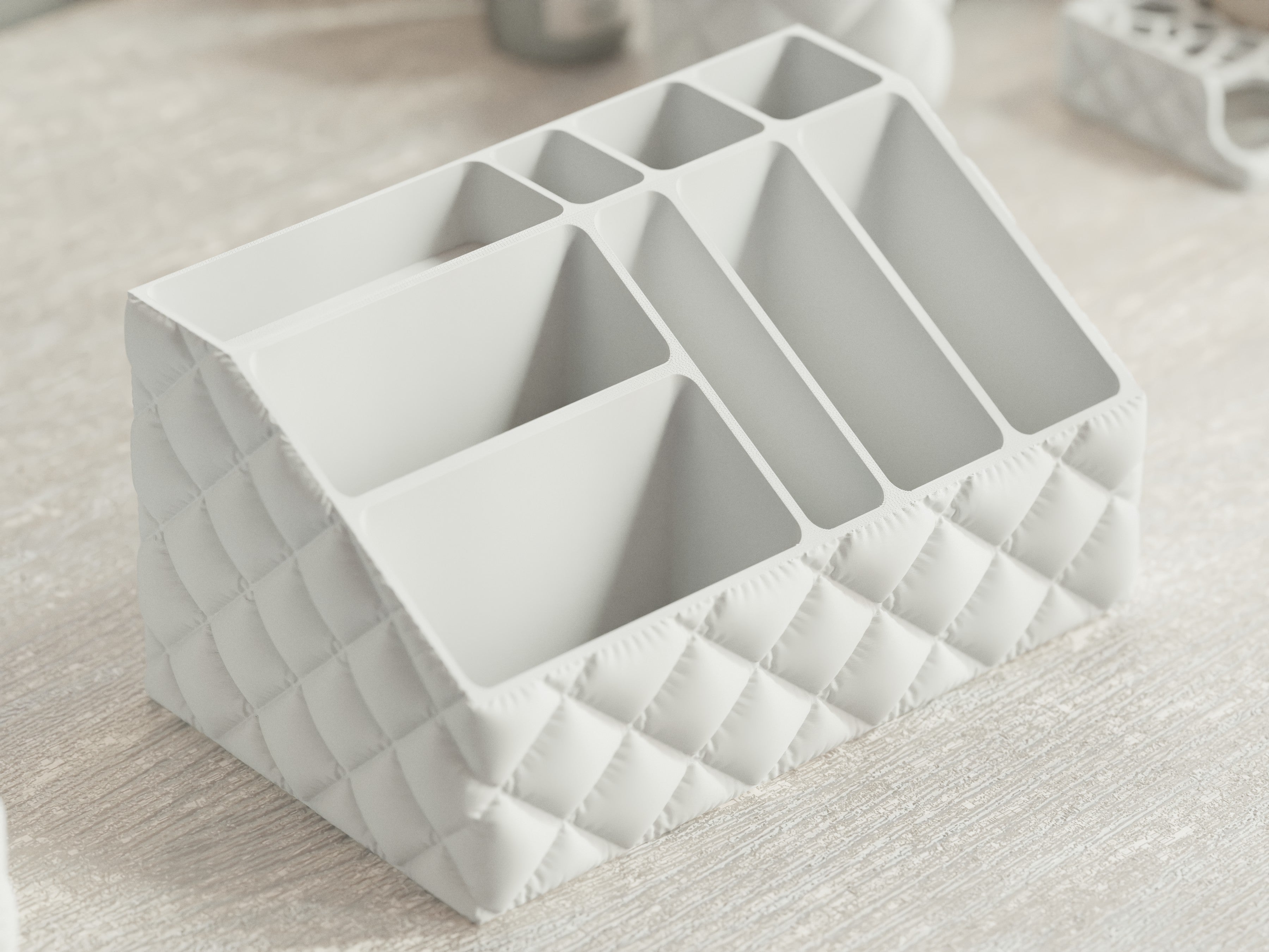 Velvera sculpted makeup organizer with quilted texture in a soft ivory finish